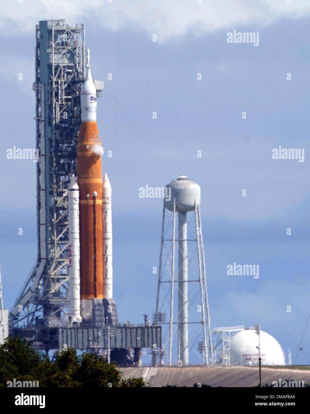 The NASA moon rocket for the Artemis mission stands on Pad 39B at the ...
