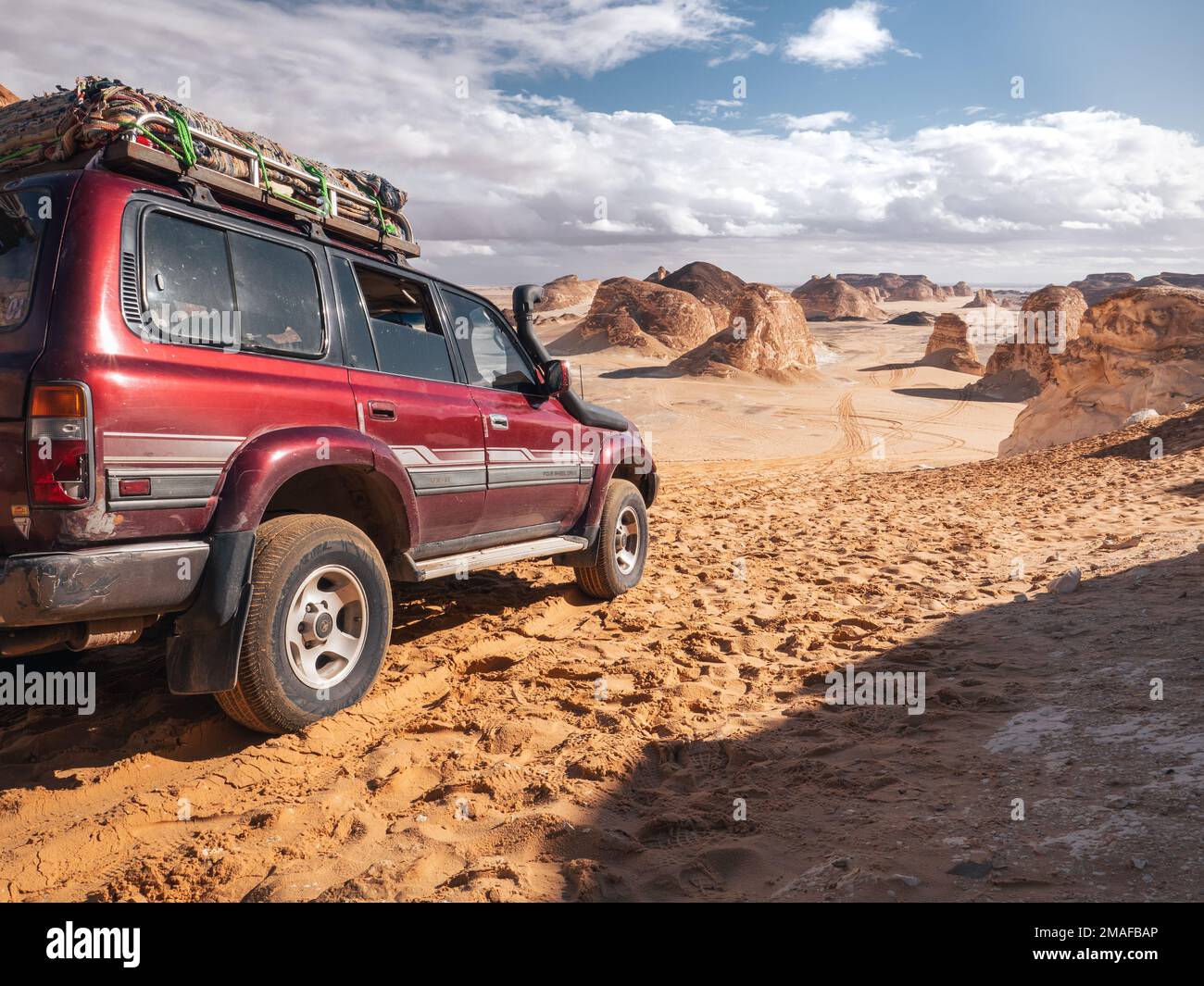 View of a jeep and the landscape of Valley of Agabat, Farafra Oasis