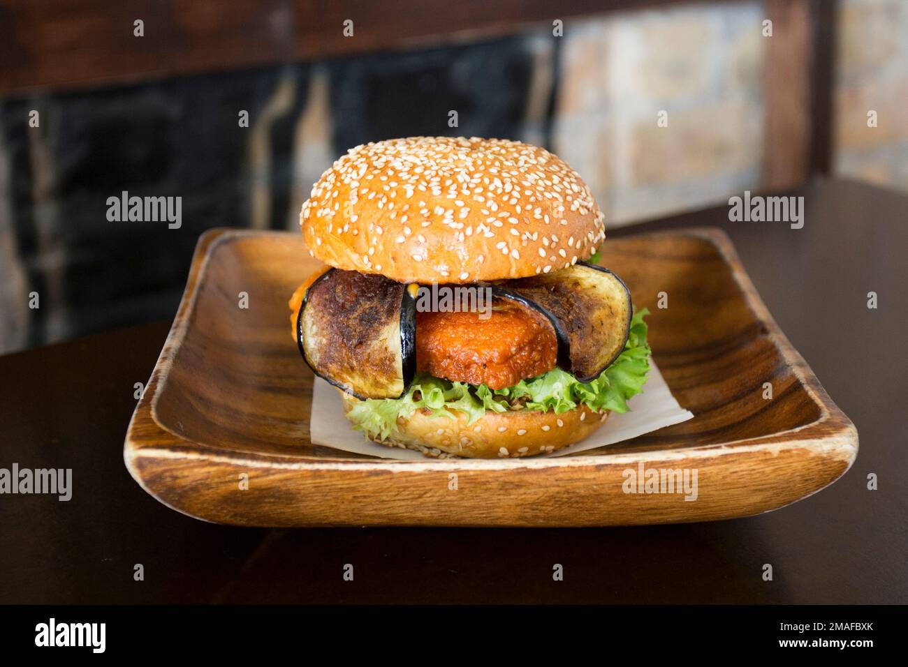 Vegetarian burger made with a mixture of vegetables and products such as tofu or seitan. Stock Photo