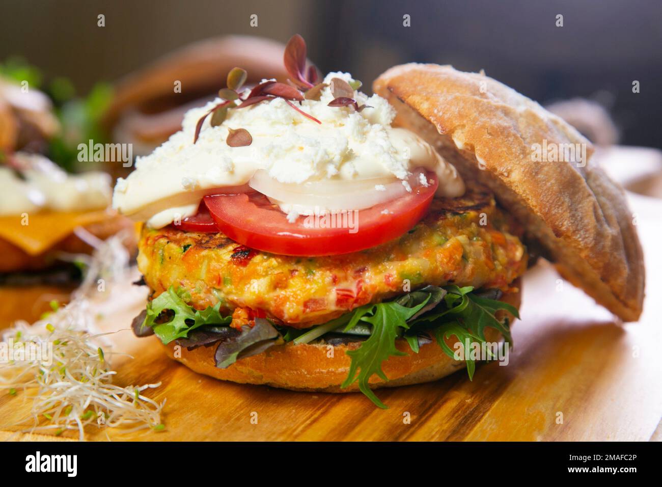 Vegetarian burger made with a mixture of vegetables and products such as tofu or seitan. Stock Photo