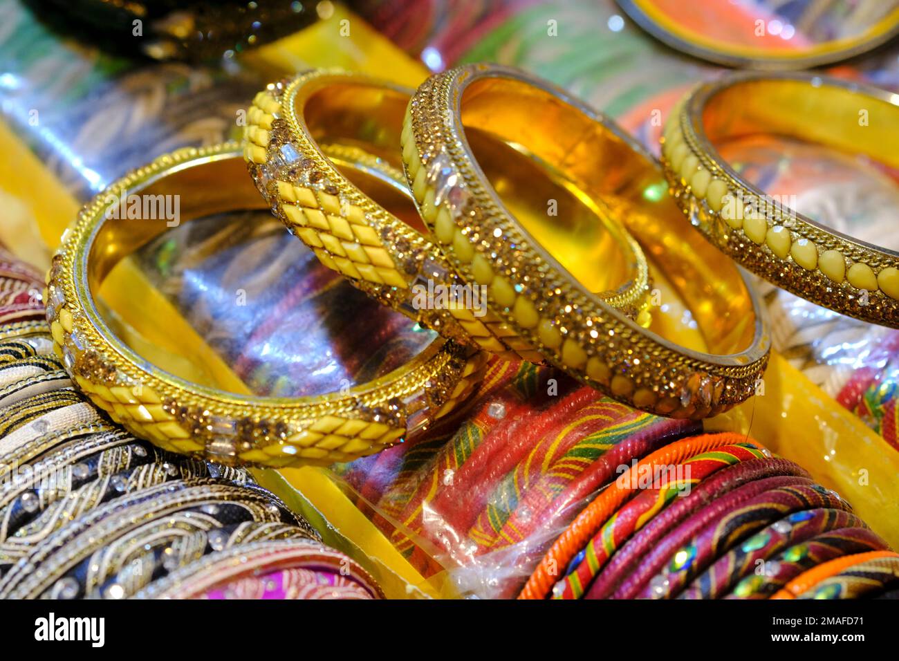 Local Bangles Indian Gold bangles displayed in local shop in a market of Pune, India ...