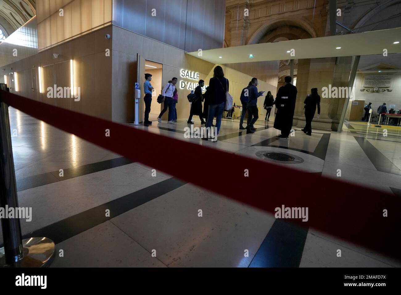 Lawyers and journalists walk out the special courtroom of the Nice