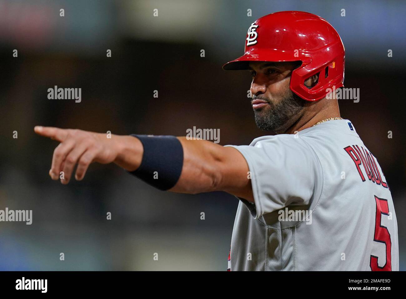 What Pros Wear: What Pros Wear: Albert Pujols (Glove, Chain