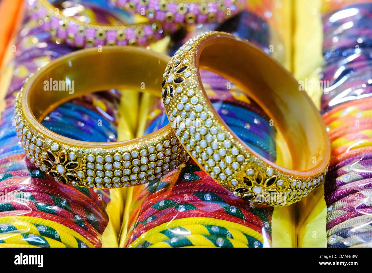 Local Bangles Indian Gold bangles displayed in local shop in a market of Pune, India ...