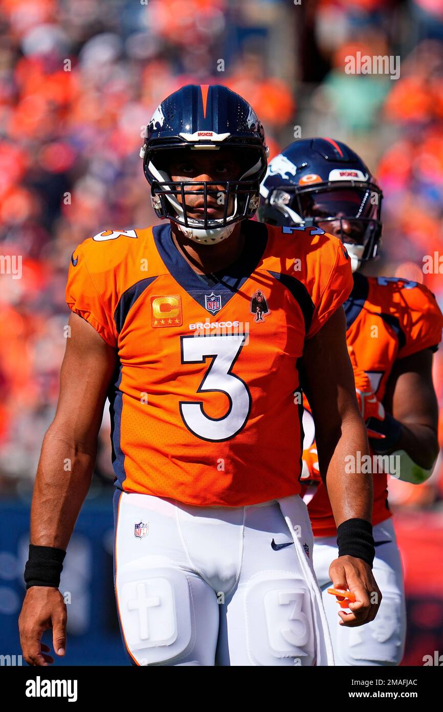 Denver Broncos quarterback Russell Wilson (3) take a drink against the  Houston Texans during an NFL football game Sunday, Sept. 18, 2022, in Denver.  (AP Photo/Jack Dempsey Stock Photo - Alamy