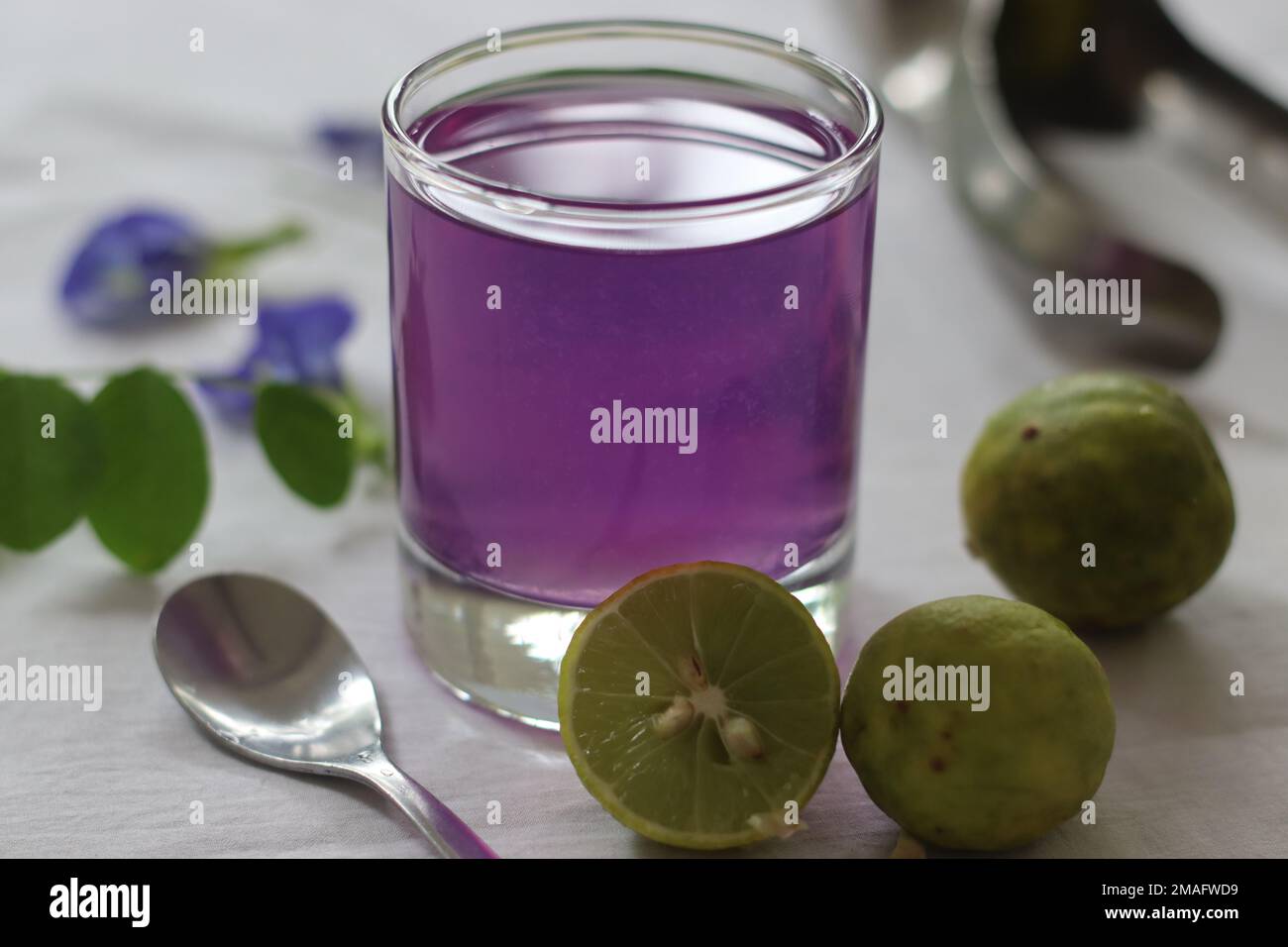 Pink coloured butterfly pea flower tea. Blue coloured butterfly pea