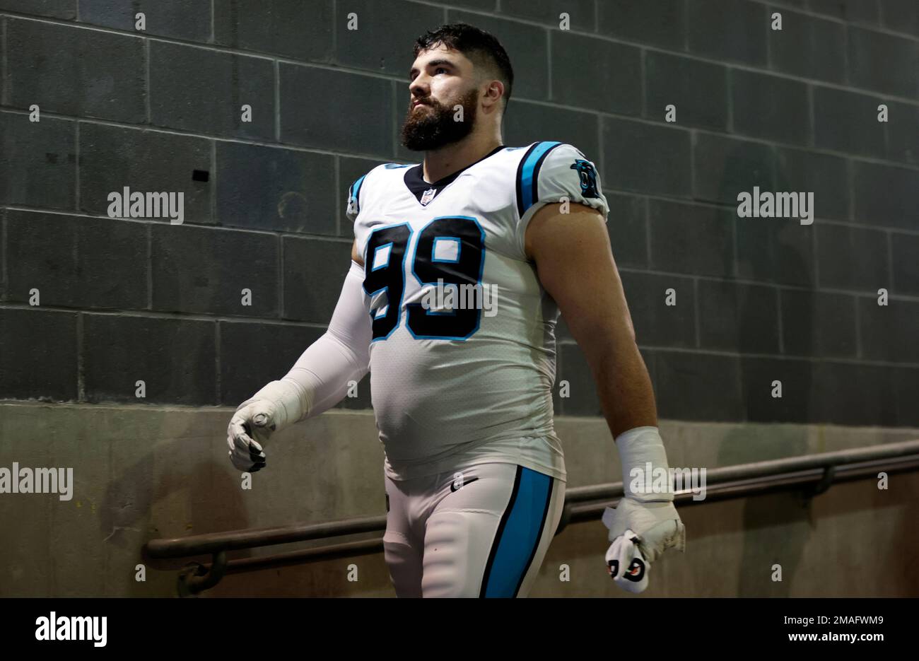 Carolina Panthers defensive tackle Matt Ioannidis (99) takes the field  before an NFL football game against the New York Giants on Sunday, Sept.  18, 2022, in East Rutherford, N.J. (AP Photo/Adam Hunger