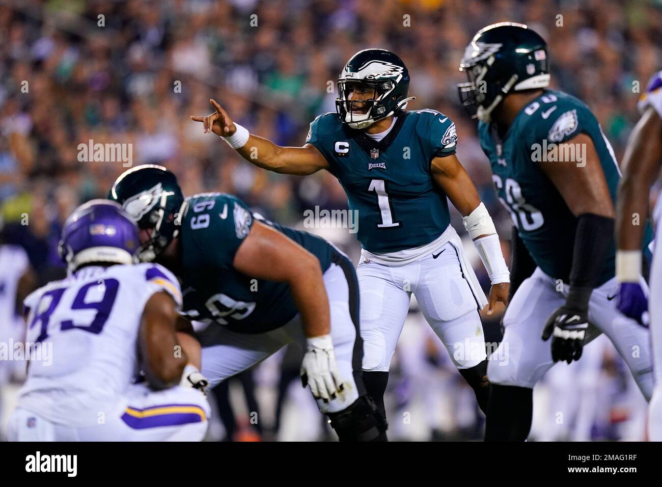 Philadelphia Eagles quarterback Jalen Hurts (1) signals teammates at
