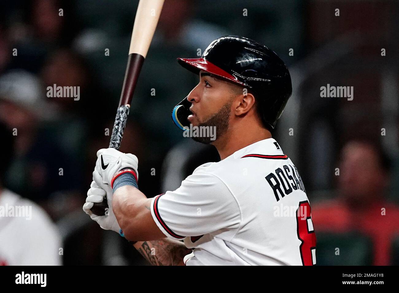 Atlanta Braves' Eddie Rosario watches his solo home run in the seventh