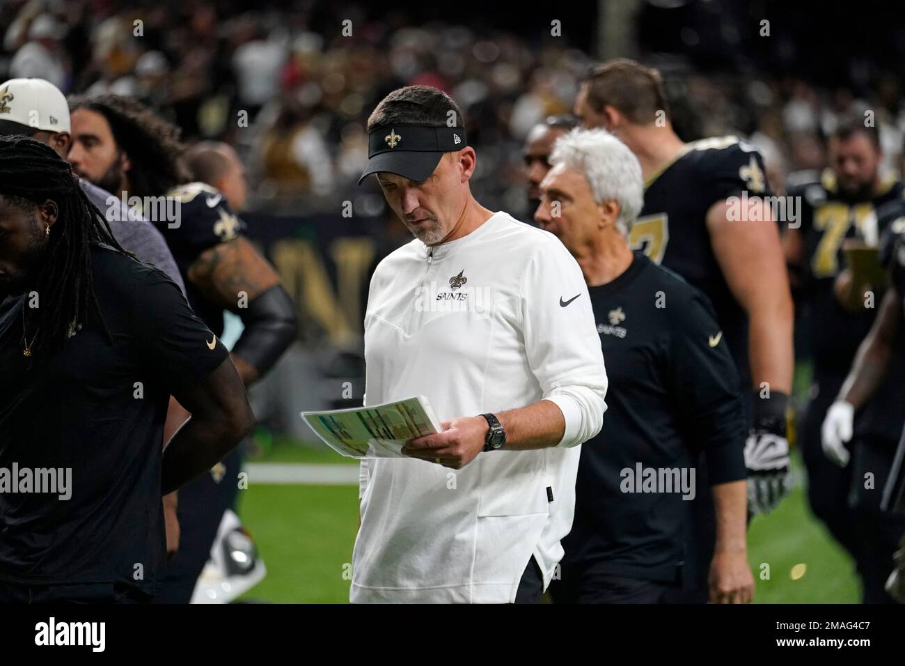 New Orleans Saints head coach Dennis Allen walks off the field at the