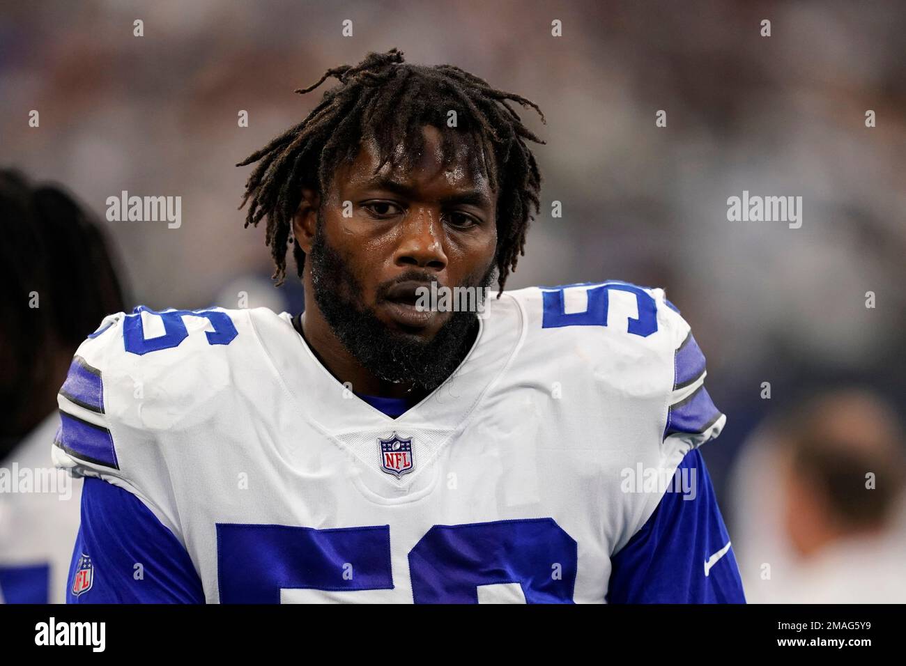 Dallas Cowboys defensive end Dante Fowler Jr. walks to the sideline bench  durin ga NFL football game against the Cincinnati Bengals in Arlington,  Texas, Sunday, Sept. 17, 2022. (AP Photo/Tony Gutierrez Stock