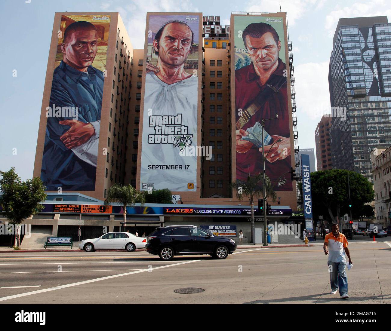 file-a-grand-theft-auto-v-billboard-is-displayed-at-figueroa-hotel-on-sept-10-2013-in-los-angeles-video-game-producer-rockstar-games-said-monday-sept-19-2022-that-early-development-footage-from-the-next-version-of-its-popular-title-grand-theft-auto-was-stolen-in-the-hack-of-its-network-ap-photonick-ut-file-2MAG715.jpg