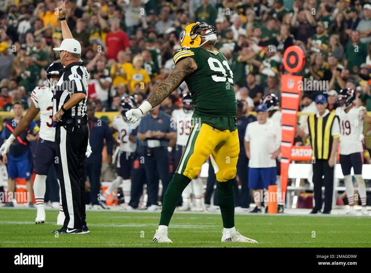Green Bay Packers linebacker Preston Smith (91) celebrates after sacking  Chicago Bears quarterback Justin Fields during the first half of an NFL  football game Sunday, Sept. 18, 2022, in Green Bay, Wis. (