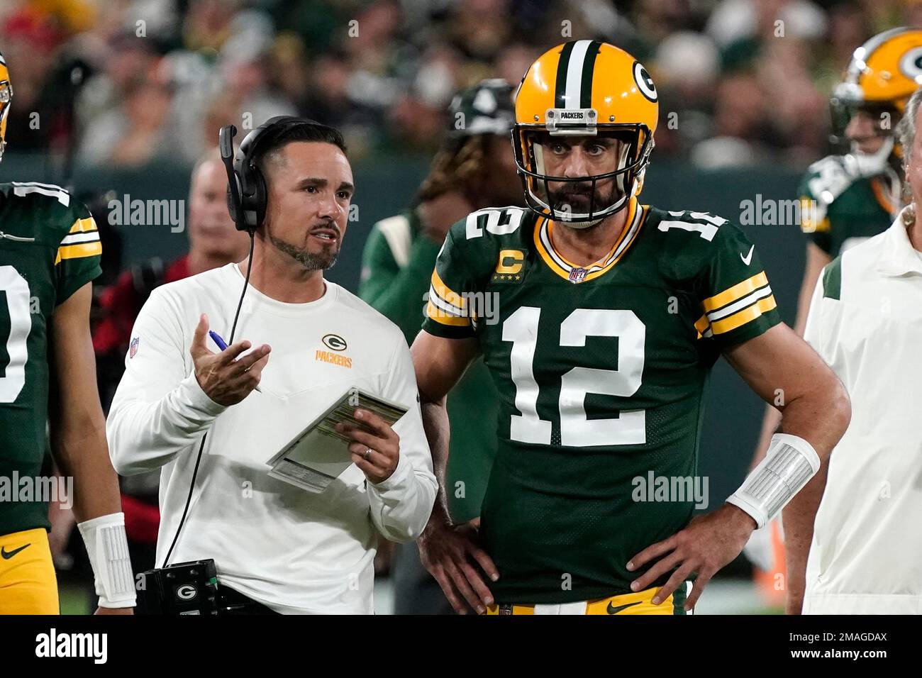 Green Bay Packers head coach Matt LaFleur talks with quarterback Aaron