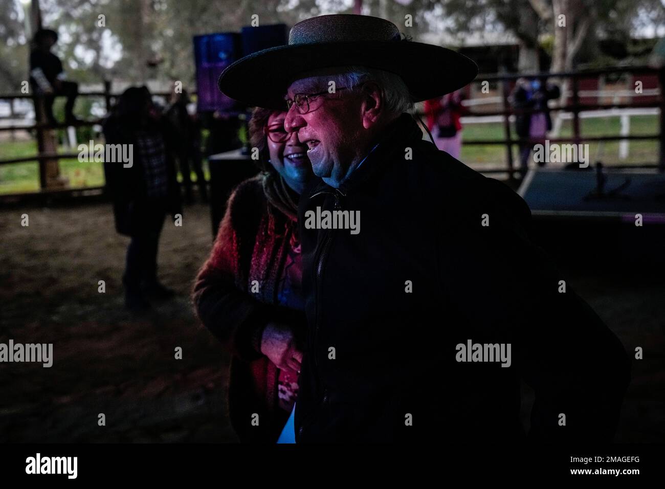 A couple dances a traditional 