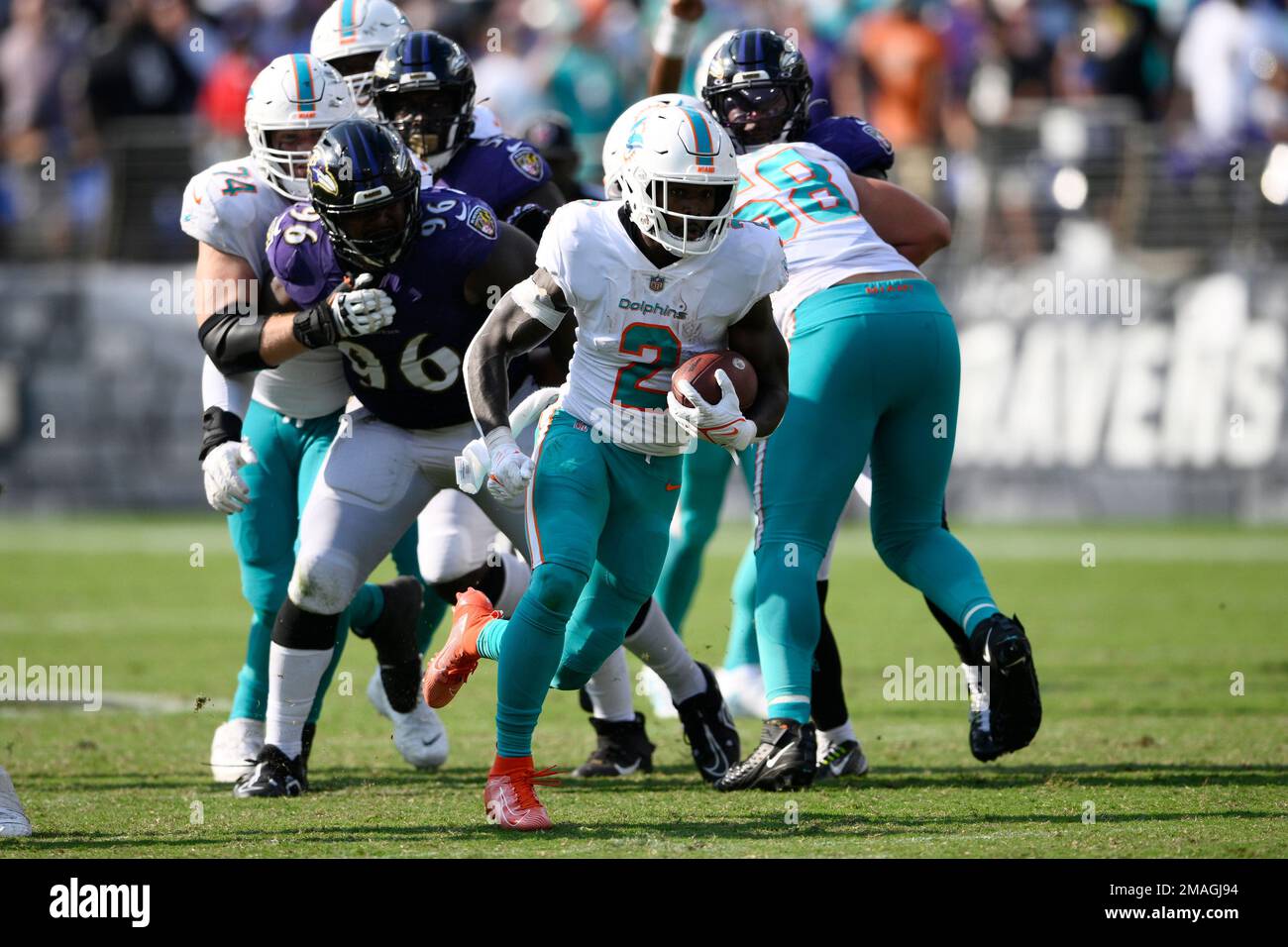 Miami Dolphins running back Chase Edmonds (2) runs the ball during the  second half of an NFL football game against the Baltimore Ravens, Sunday,  Sept. 18, 2022, in Baltimore. (AP Photo/Nick Wass