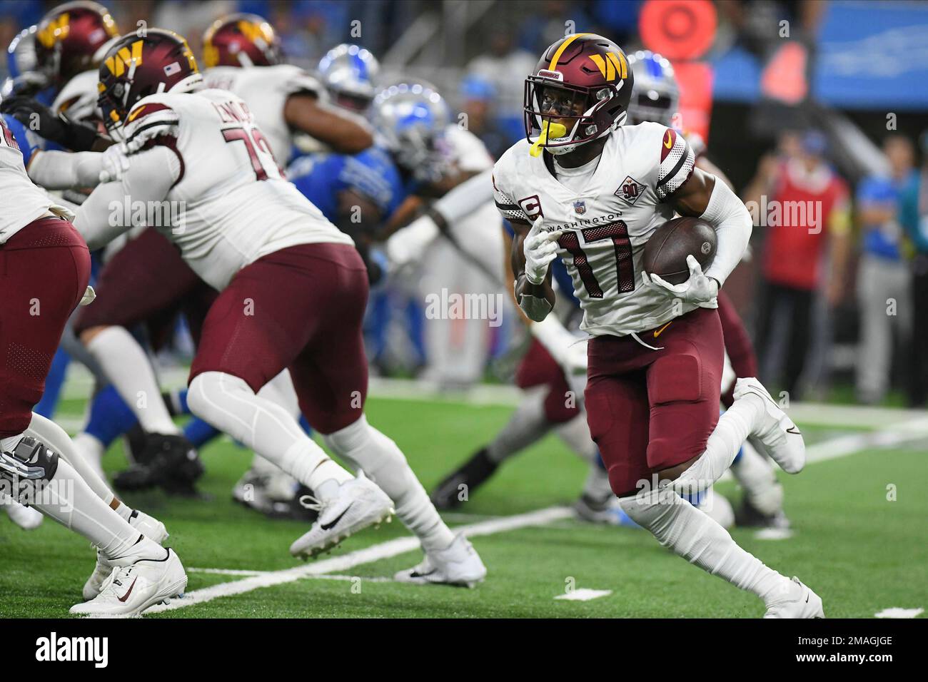 Washington Commanders wide receiver Terry McLaurin (17) runs the ball  during the second half of an NFL football game against the Detroit Lions  Sunday, Sept. 18, 2022, in Detroit. (AP Photo/Lon Horwedel