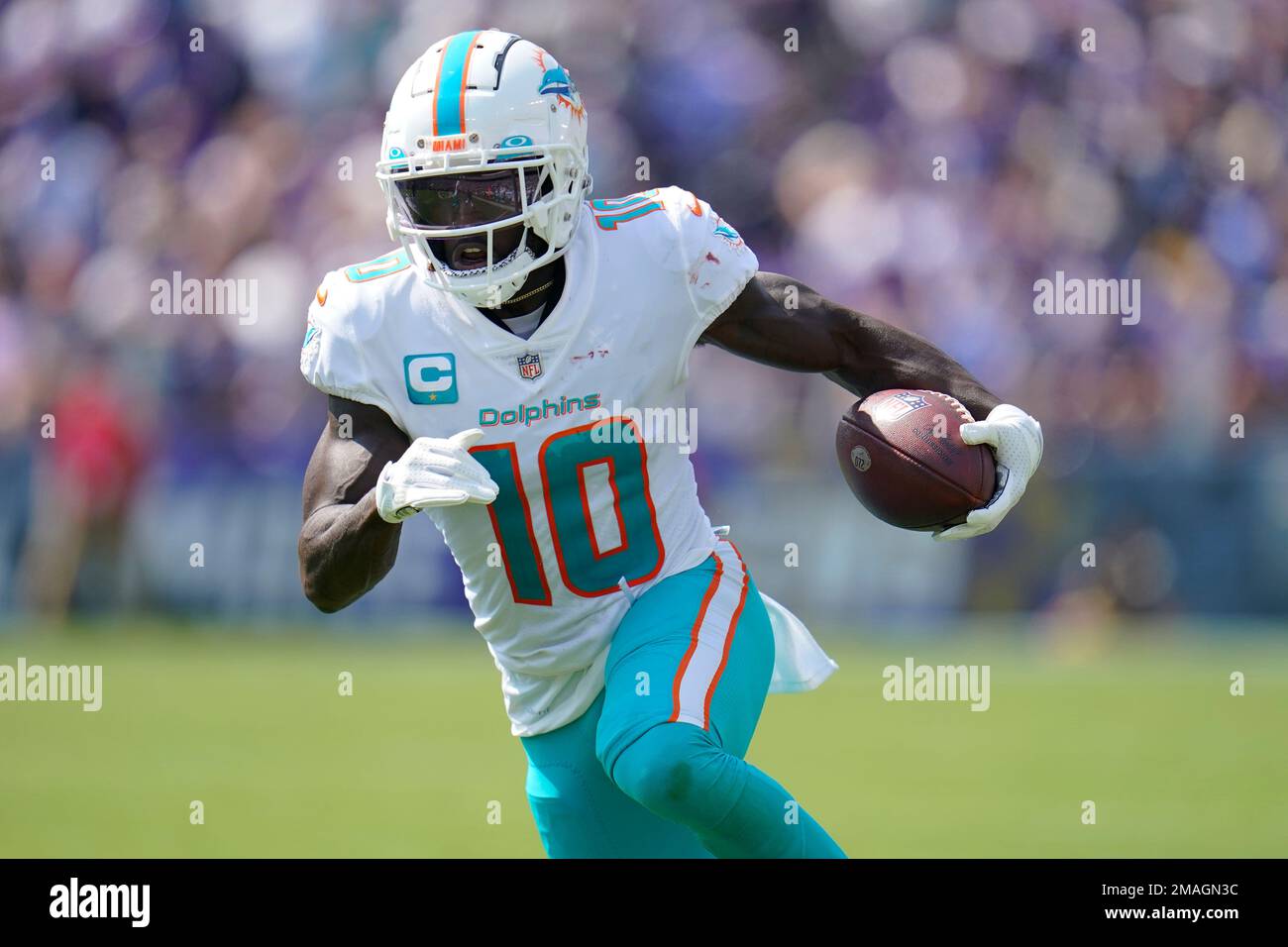 Miami Dolphins wide receiver Tyreek Hill (10) runs a play during the