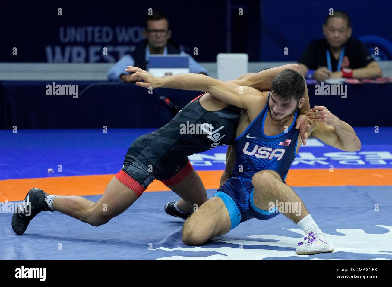 Iran's Rahman Mousa Amouzadkhalili, left, and John Michael Diakomihalis