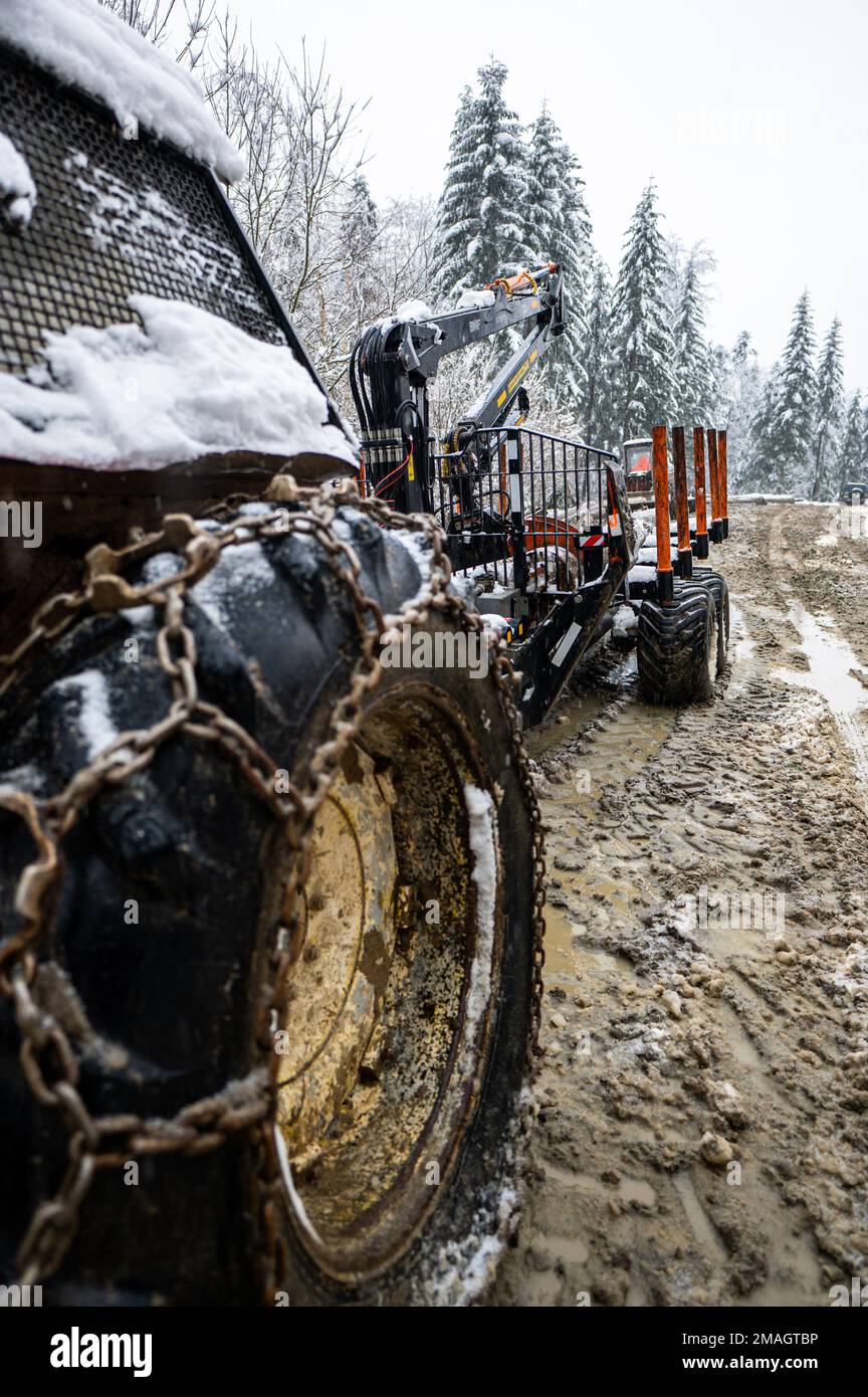 Extreme offroad 4x4 vehicle with snow and mud chains on wheels used