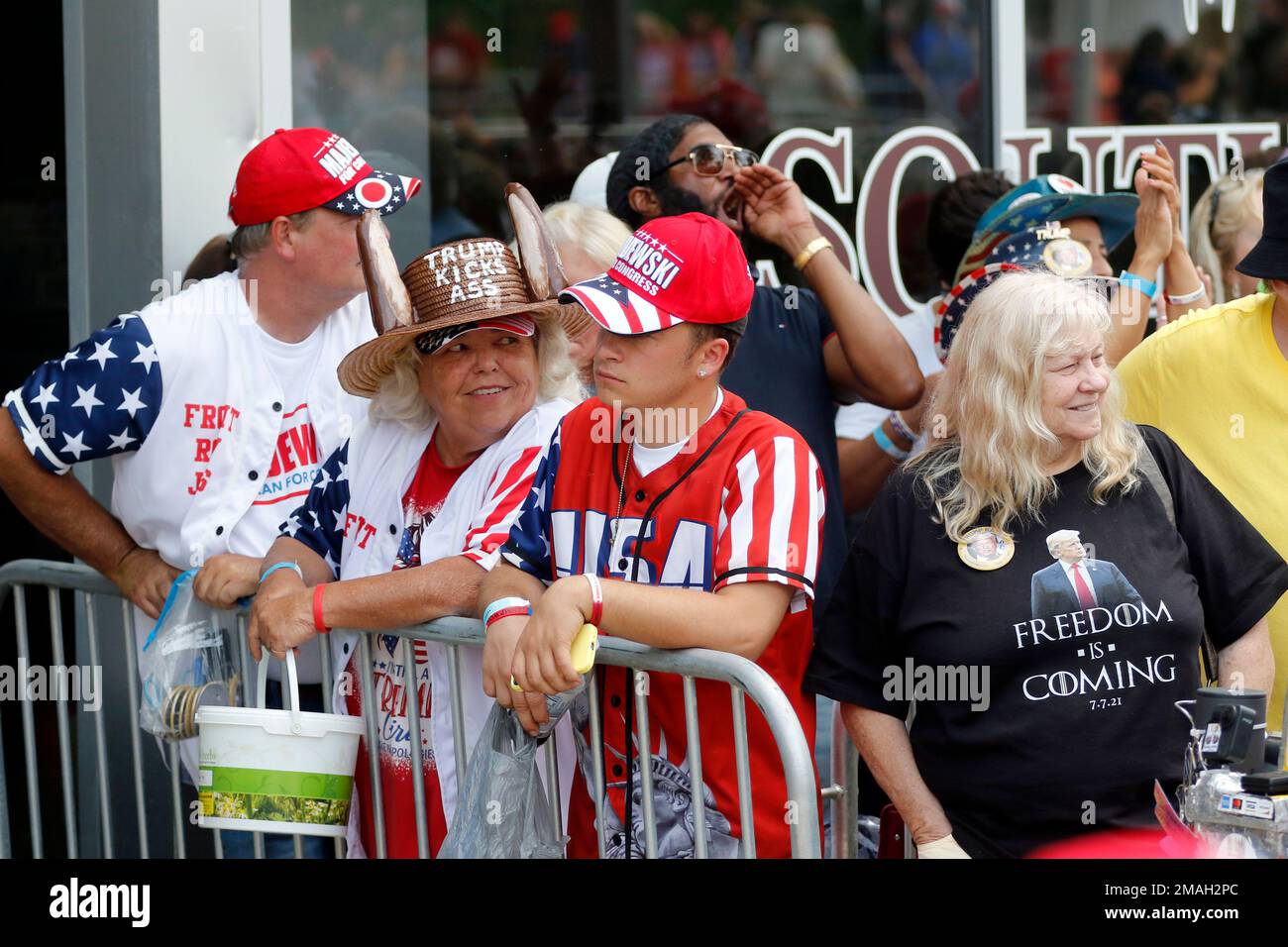 The crowd waits in line to enter the Covelli Center at a campaign rally ...
