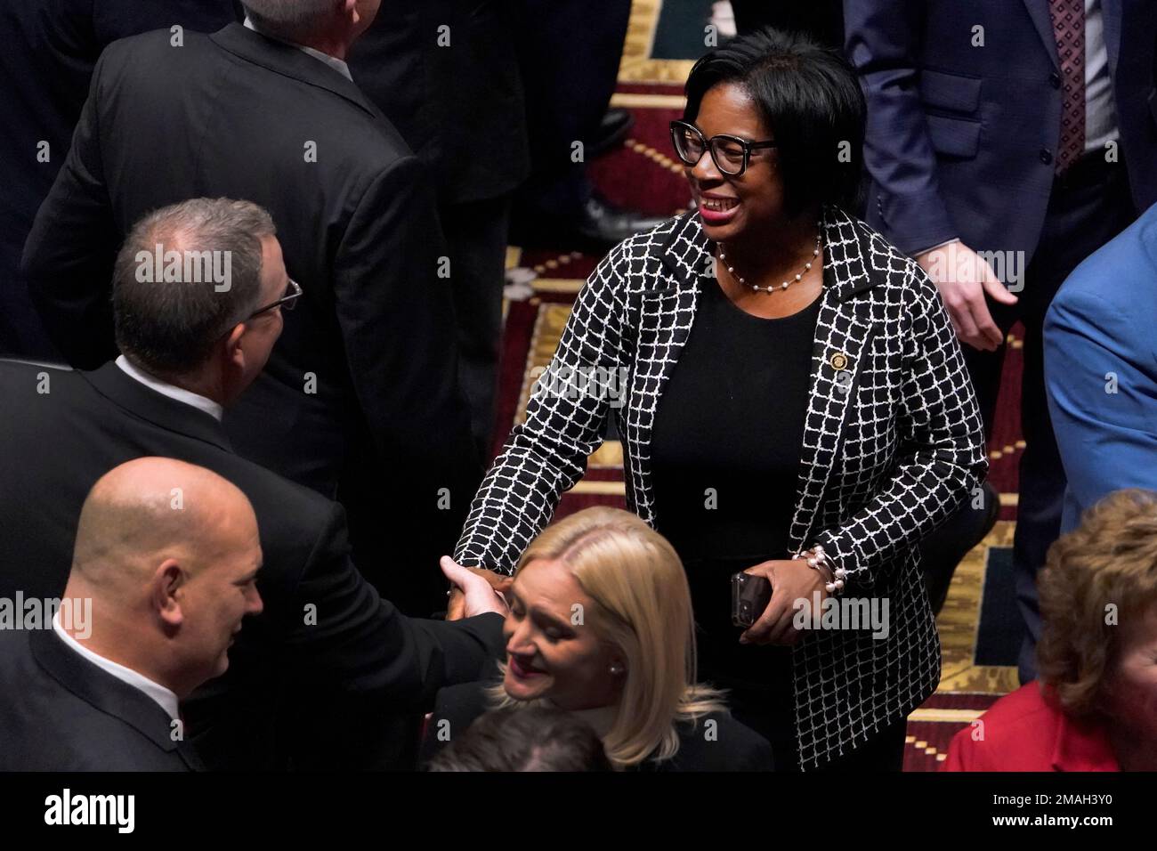 Missouri State Sen. Karla May, DSt. Louis, shakes hands with a fellow