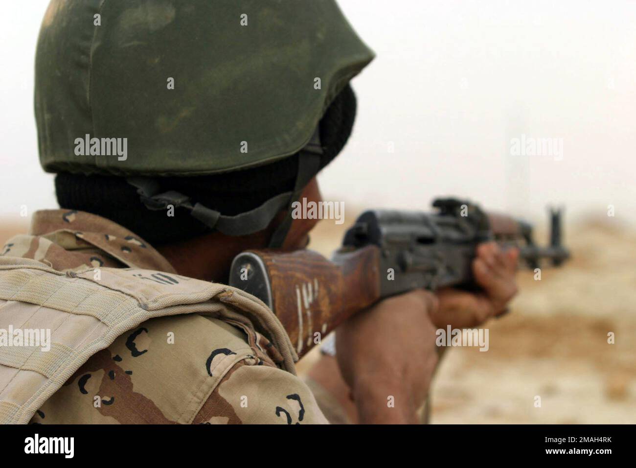 070324-M-2166H-009. [Complete] Scene Caption: An Iraqi Army Soldier in ...