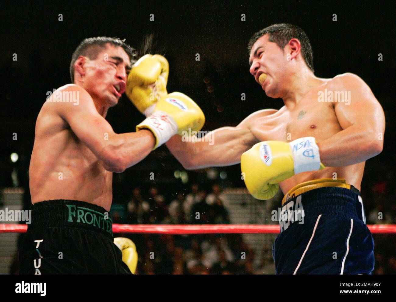 https://c8.alamy.com/comp/2MAH90Y/file-erik-morales-left-of-mexico-and-marco-antonio-barrera-of-mexico-trade-punches-in-the-11th-round-of-their-wbc-super-featherweight-title-fight-on-nov-27-2004-at-the-mgm-grand-garden-arena-in-las-vegas-the-two-mexican-greats-gave-their-all-in-three-bouts-over-nearly-five-years-providing-the-defining-moments-of-both-fighters-careersap-photomark-j-terrill-file-2MAH90Y.jpg
