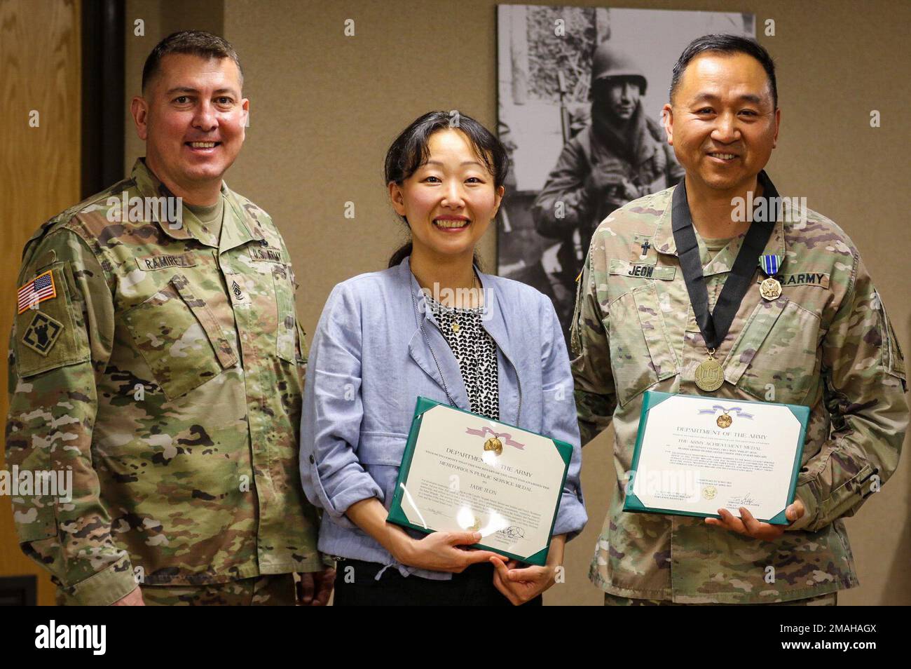 Lt. Col. Phillip Jeon, the Chaplain for 4th Cavalry Brigade, 1st Army Division East, receives the Order of Titus, an award that highlights the importance of realistic, doctrinally-guided combat ministry training in ensuring the delivery of prevailing religious support to Soldiers. The award was presented May 26, 2022 at Fort Knox, Ky. By Command Sgt. Maj. Raymond Ramirez, the Sergeant Major of 4th Cavalry Brigade. Chaplain Jeon’s wife Jade was also awarded the Meritorious Public Service Medal for her outstanding commitment to the Brigade. Stock Photo