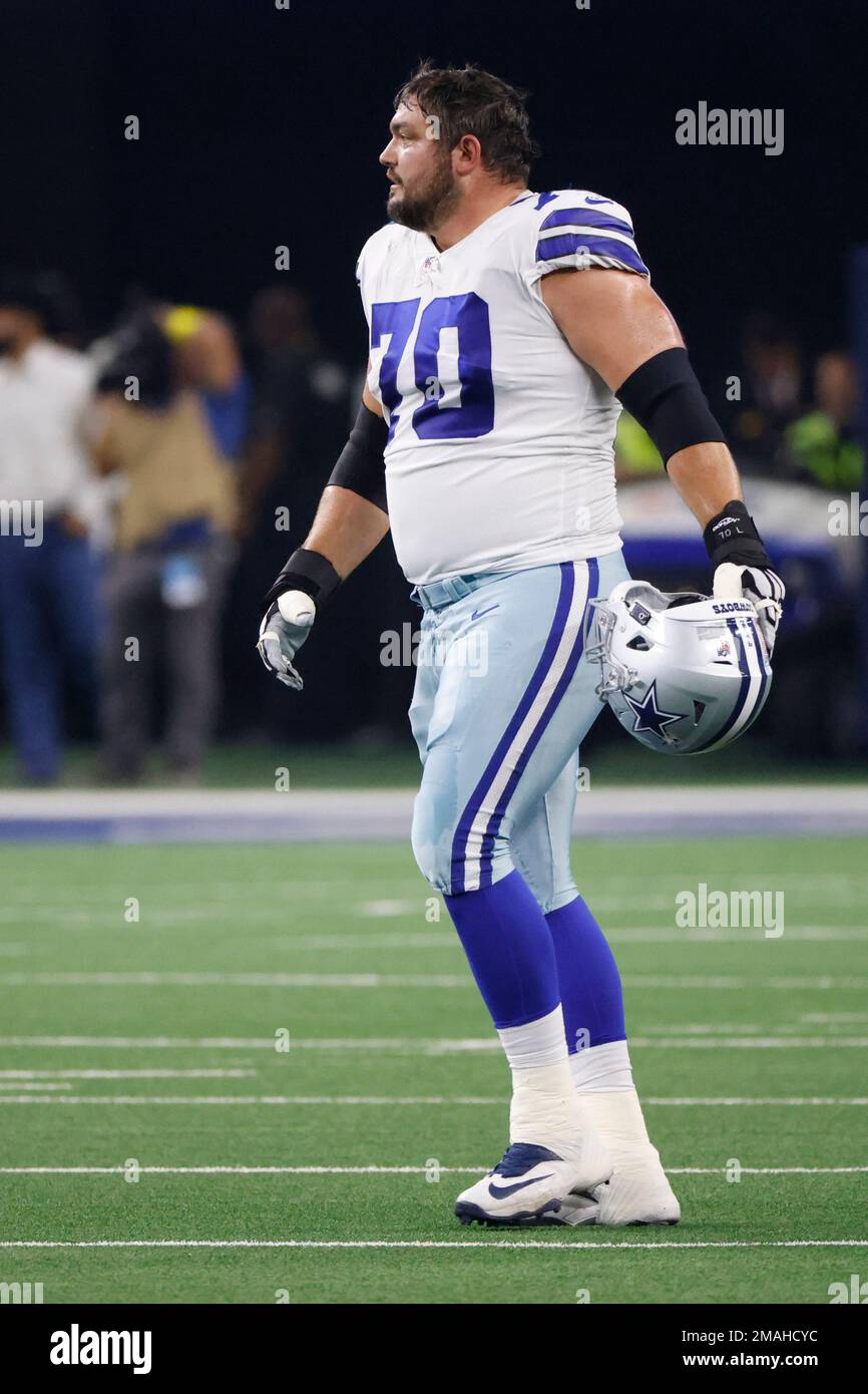 ARLINGTON, TX - DECEMBER 11: Dallas Cowboys Zack Martin (70) blocks during  the game featuring the