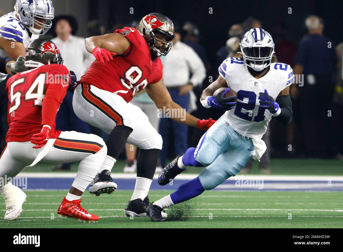 Dallas Cowboys running back Ezekiel Elliott (21) carries the ball during  the first half of an NFL football game against the Washington Commanders,  Sunday, Oct. 2, 2022, in Arlington, Texas. Dallas won