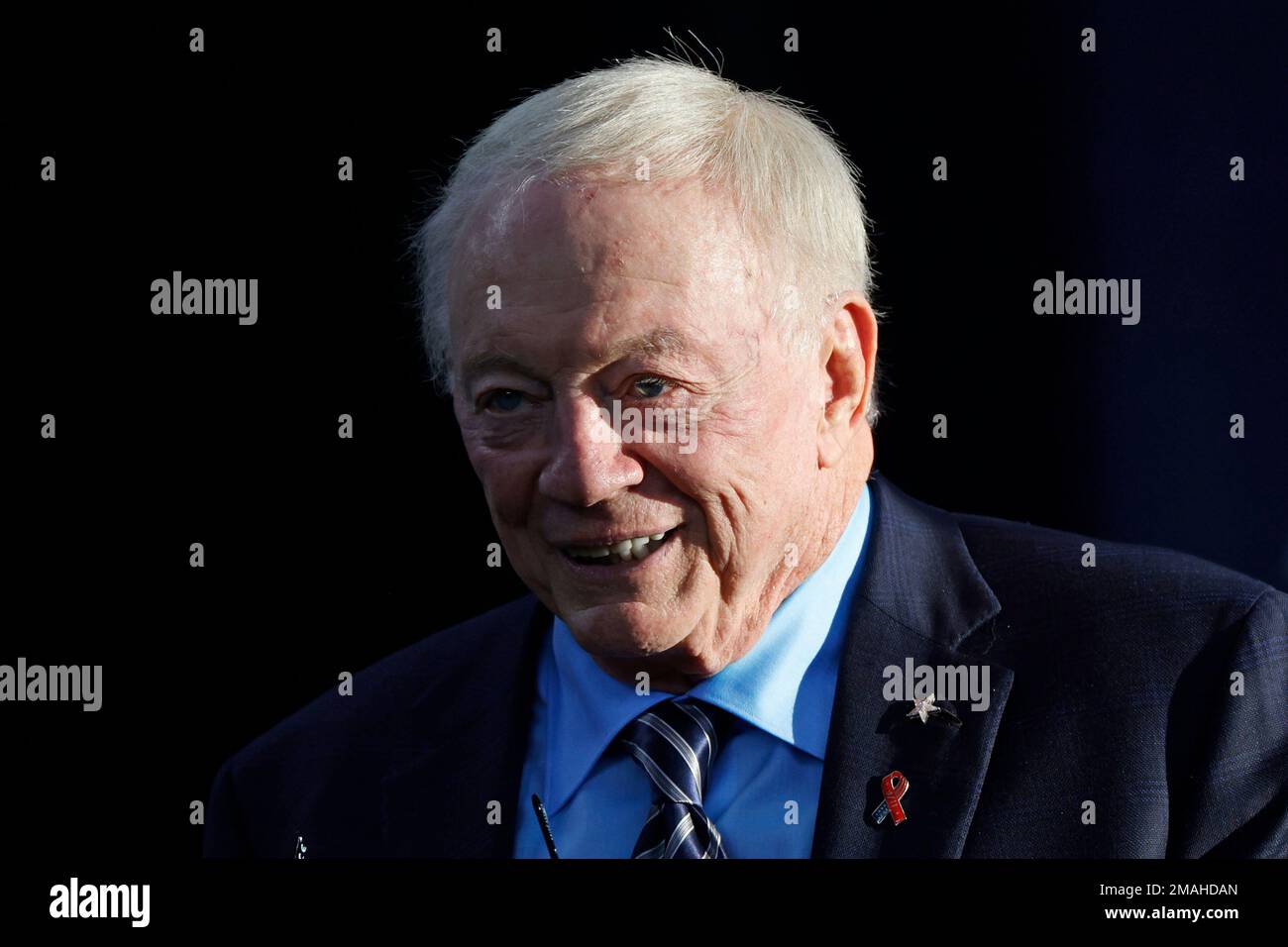 Dallas Cowboys owner and general manager Jerry Jones arrives on the field  before the Dallas Cowboys play the Tampa Bay Buccaneers in an NFL football  game in Arlington, Texas, Sunday, Sept. 11