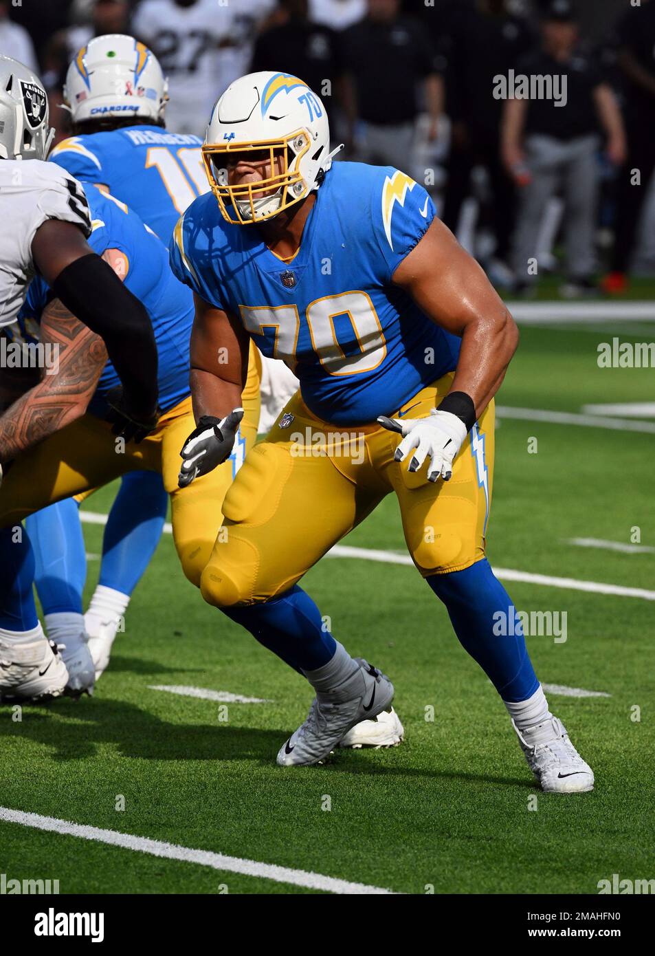 Tackle (70) Rashawn Slater of the Los Angeles Chargers blocks