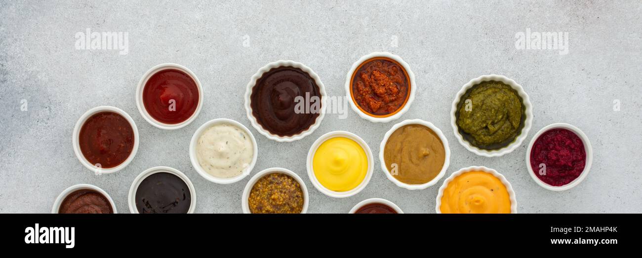 Different types of sauces in bowls banner , ketchup and mayonnaise