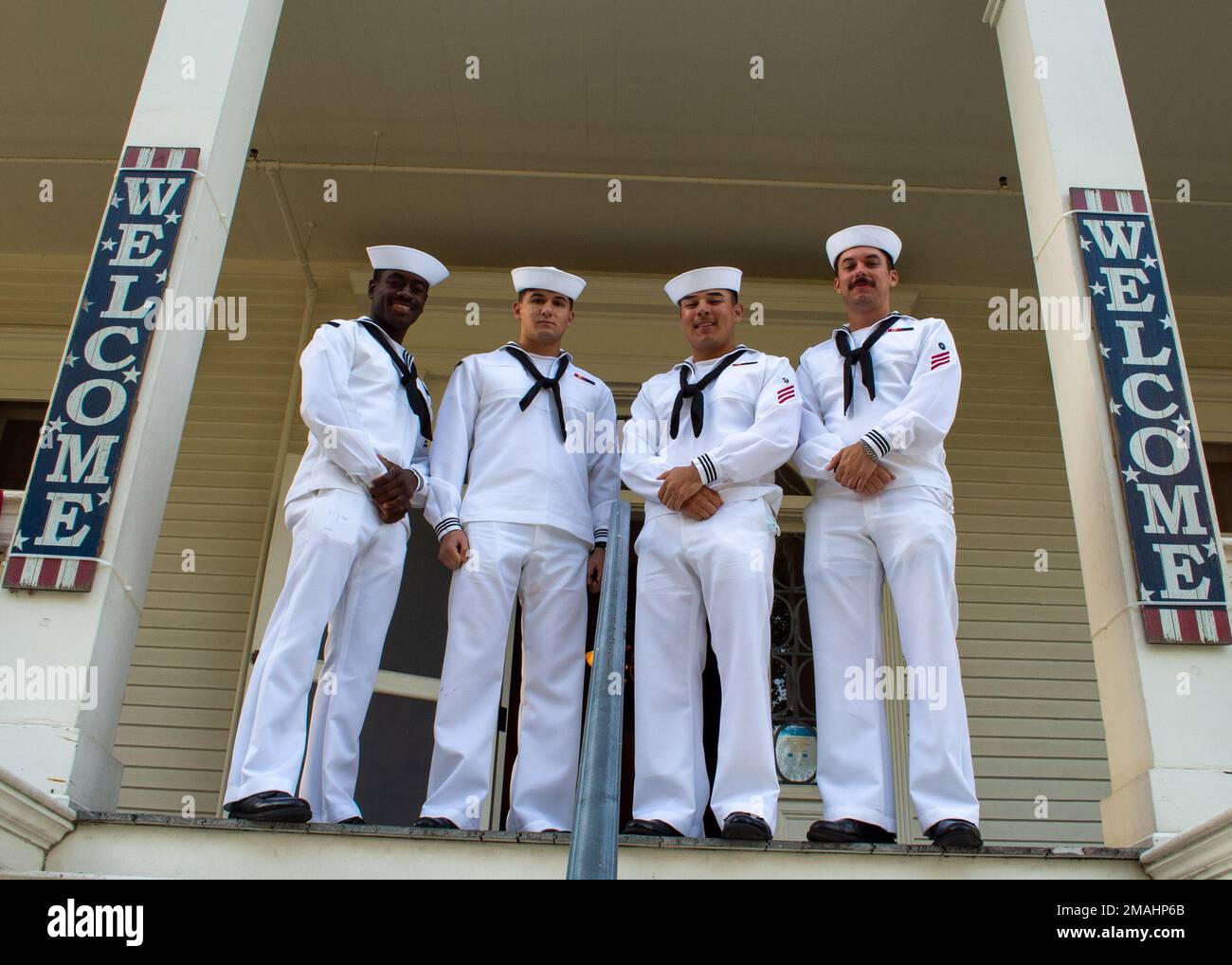 Wilmington, Calif. (May 27, 2022) - Sailors, assigned to Assault Craft Unit (ACU) 1, pose for a photograph in front of the Banning Museum located in Wilmington, Calif. for a Welcome Celebration during Los Angeles Fleet Week. LAFW is an opportunity for the American public to meet their Navy, Marine Corps and Coast Guard teams and experience America's sea services. During fleet week, service members participate in various community service events, showcase capabilities and equipment to the community, and enjoy the hospitality of Los Angeles and its surrounding areas. Stock Photo