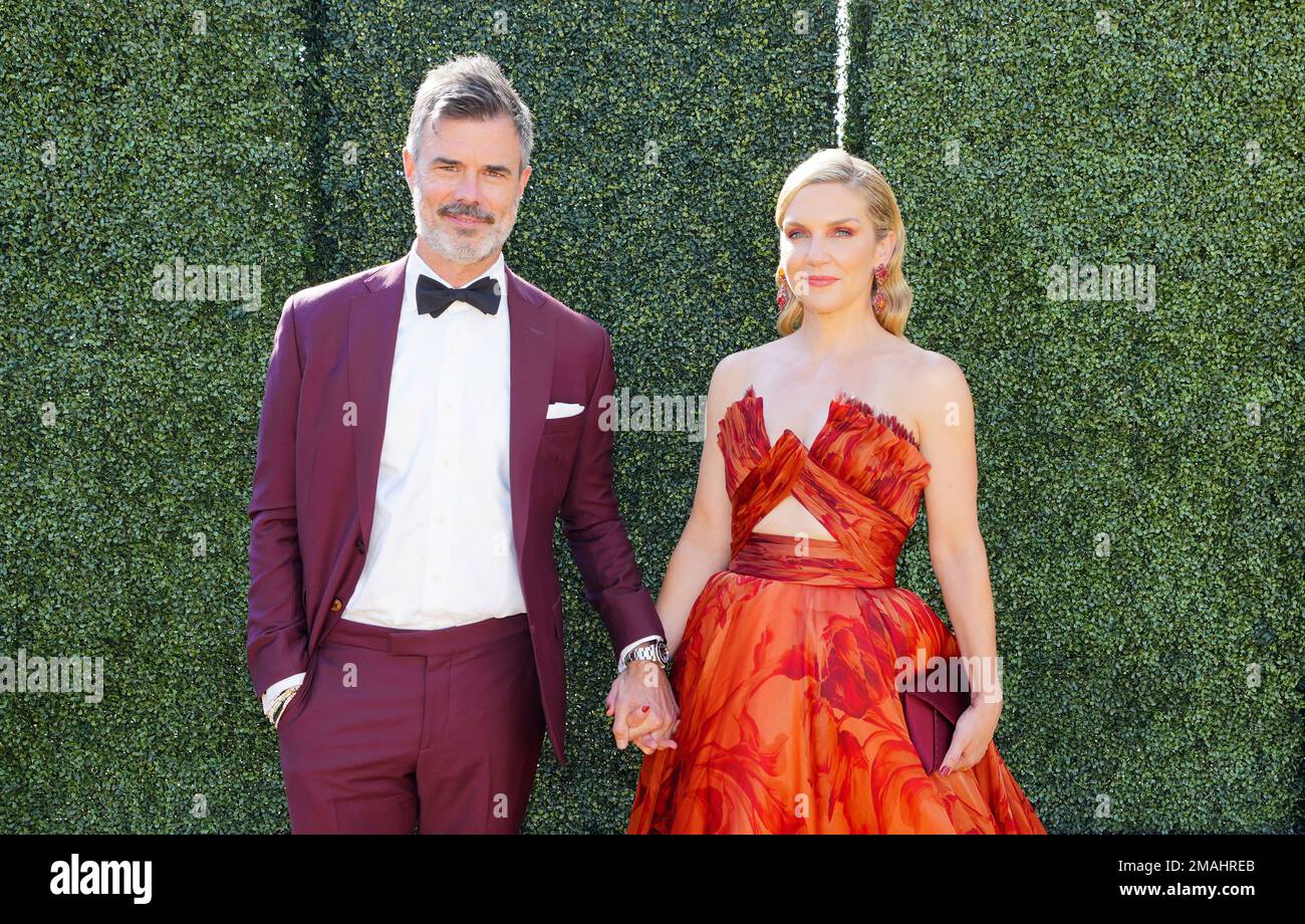 Graham Larson, left, and Rhea Seehorn arrive at the 74th Emmy Awards on