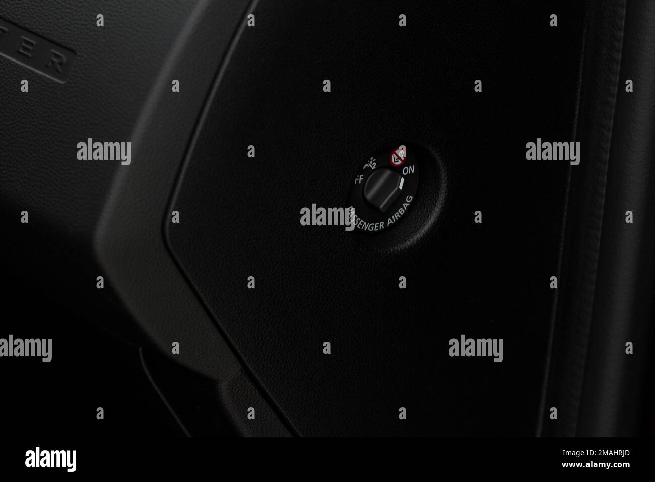 Front passenger airbag on and off switch close up view. Passenger