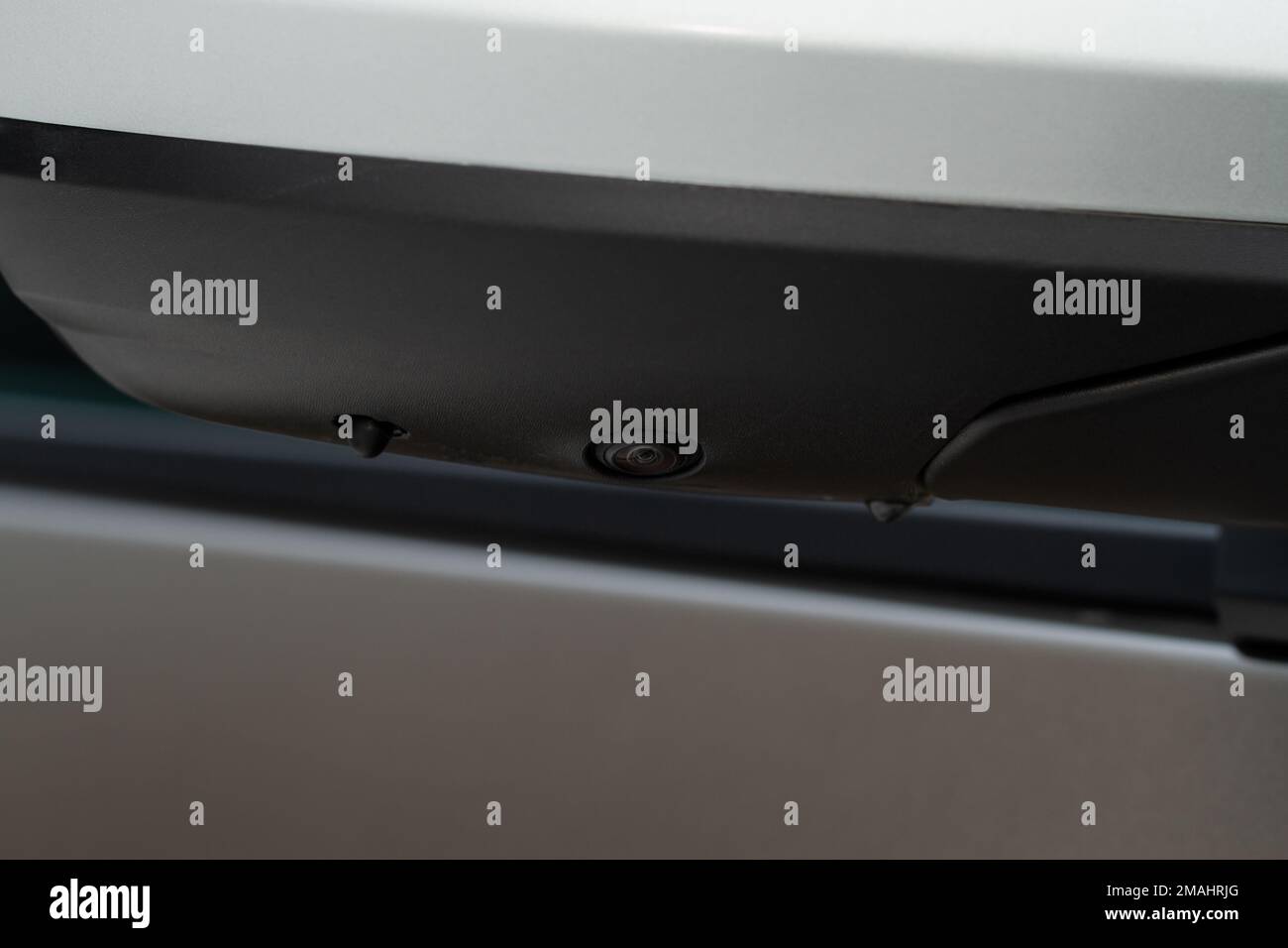 Close up view of surround view camera system on modern car side rear