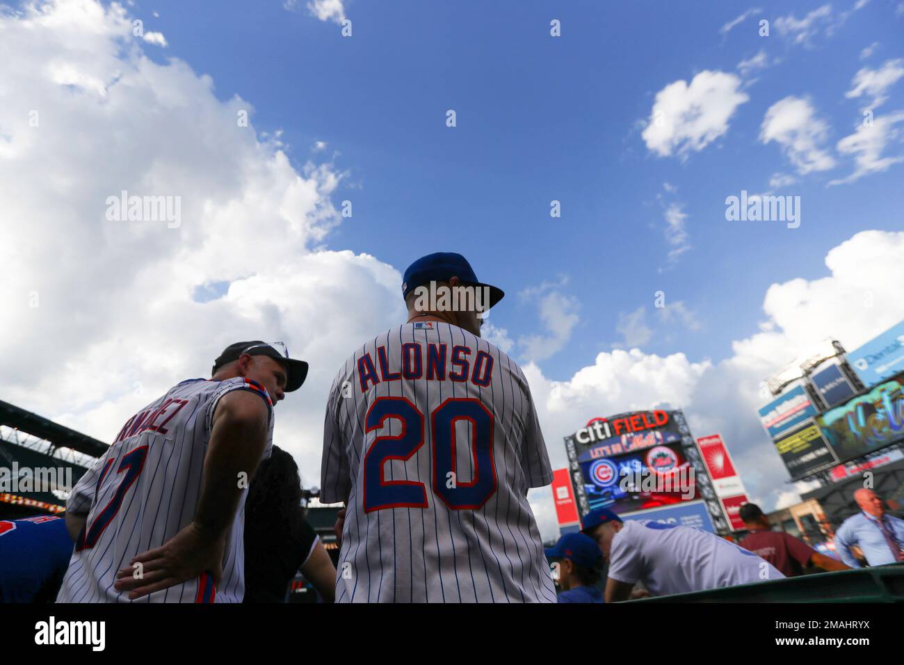 A New York Mets fan watches batting practice before a baseball game between  the Chicago Cubs and the New York Mets, Tuesday, Sept. 13, 2022, in New  York. (AP Photo/Jessie Alcheh Stock