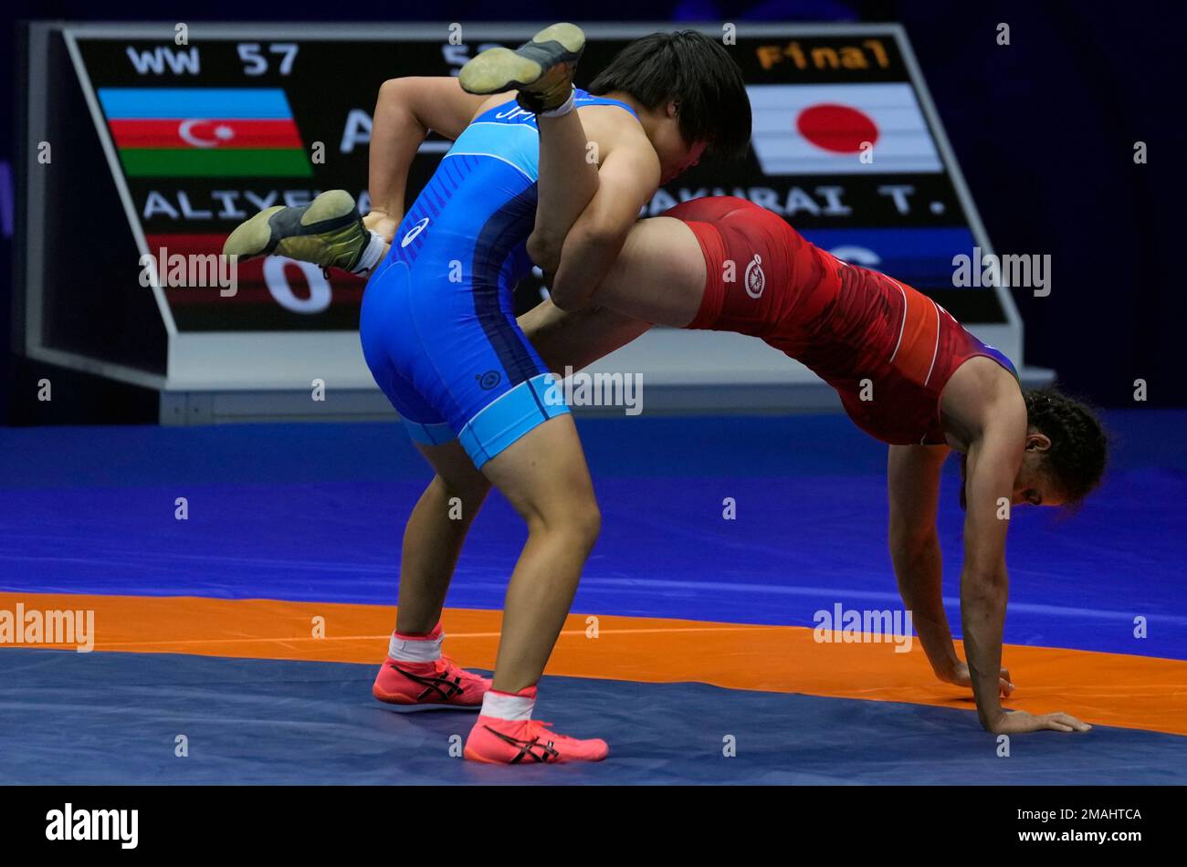 Japan's Tsugumi Sakurai, left, and Azerbajian's Zhala Aliyeva compete