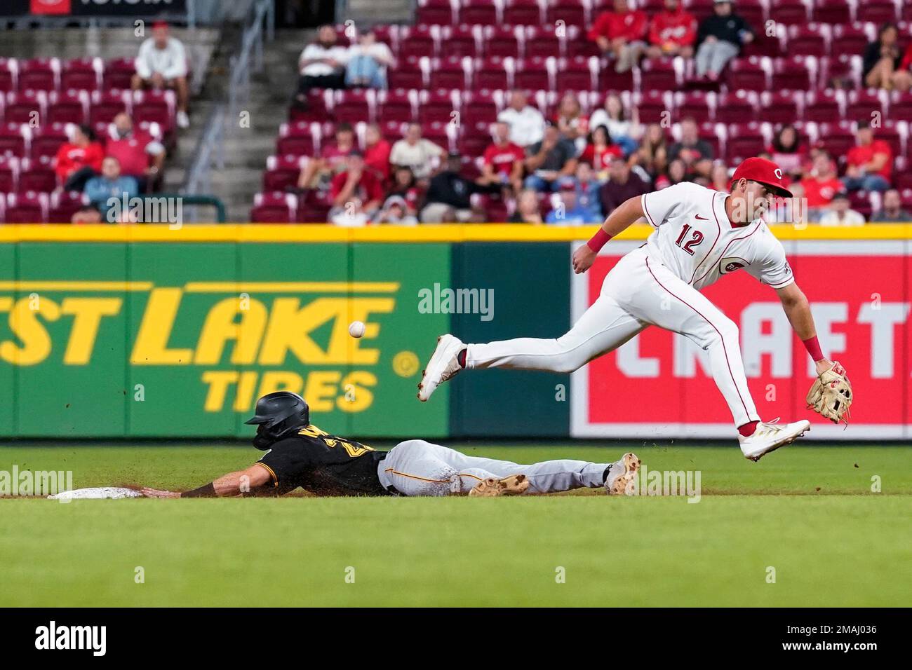 Pittsburgh Pirates' Kevin Newman, left, steals second base as