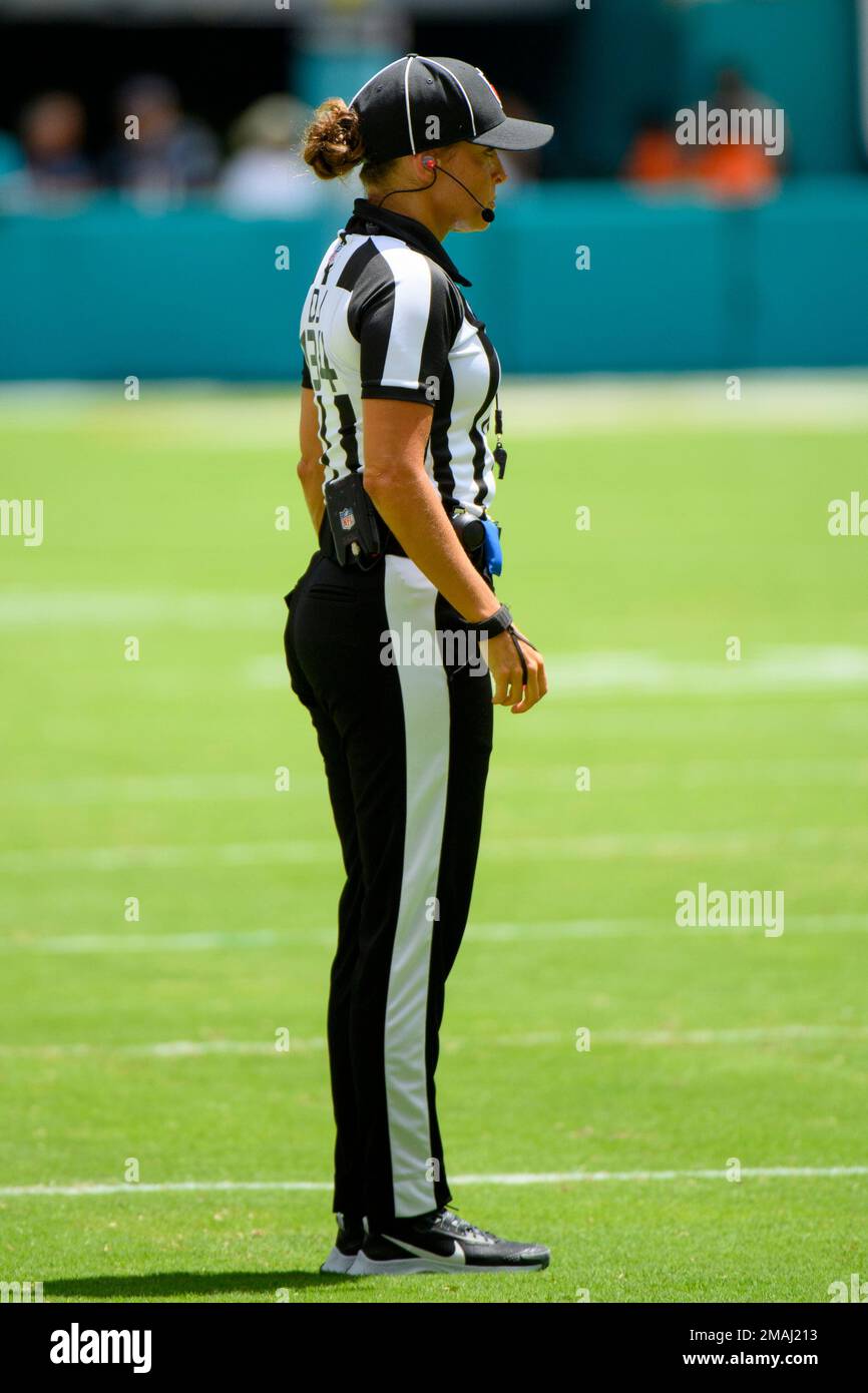 NFL Down Judge Robin DeLorenzo stands on the field during an NFL