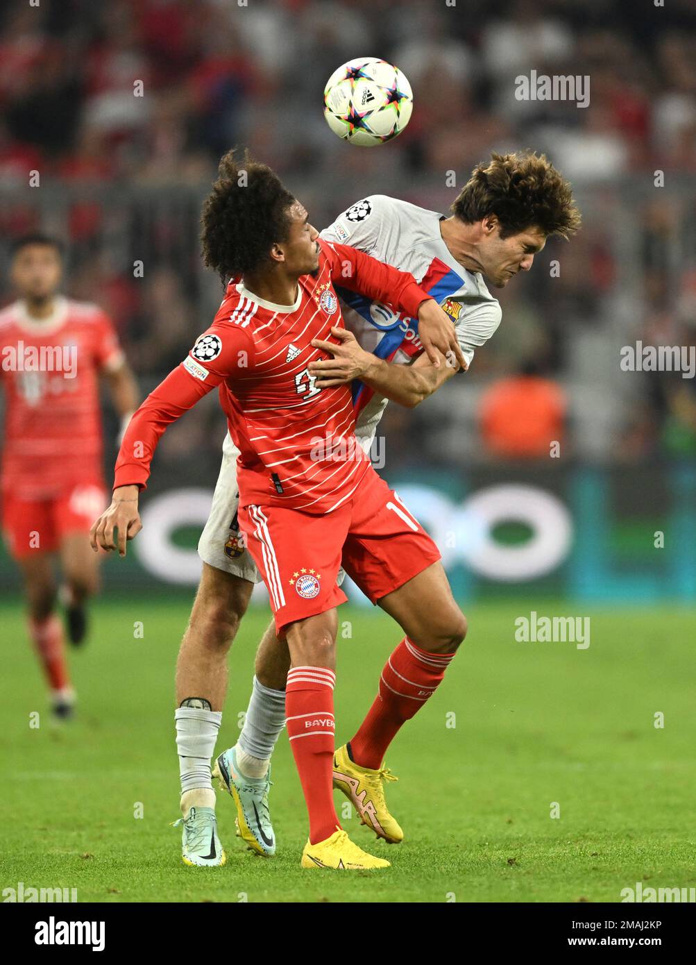 Barcelona's Marcos Alonso, right, challenges for the ball with Bayern's  Leroy Sane during the Champions League, group C soccer match between Bayern  Munich and Barcelona at the Allianz Arena in Munich, Germany,
