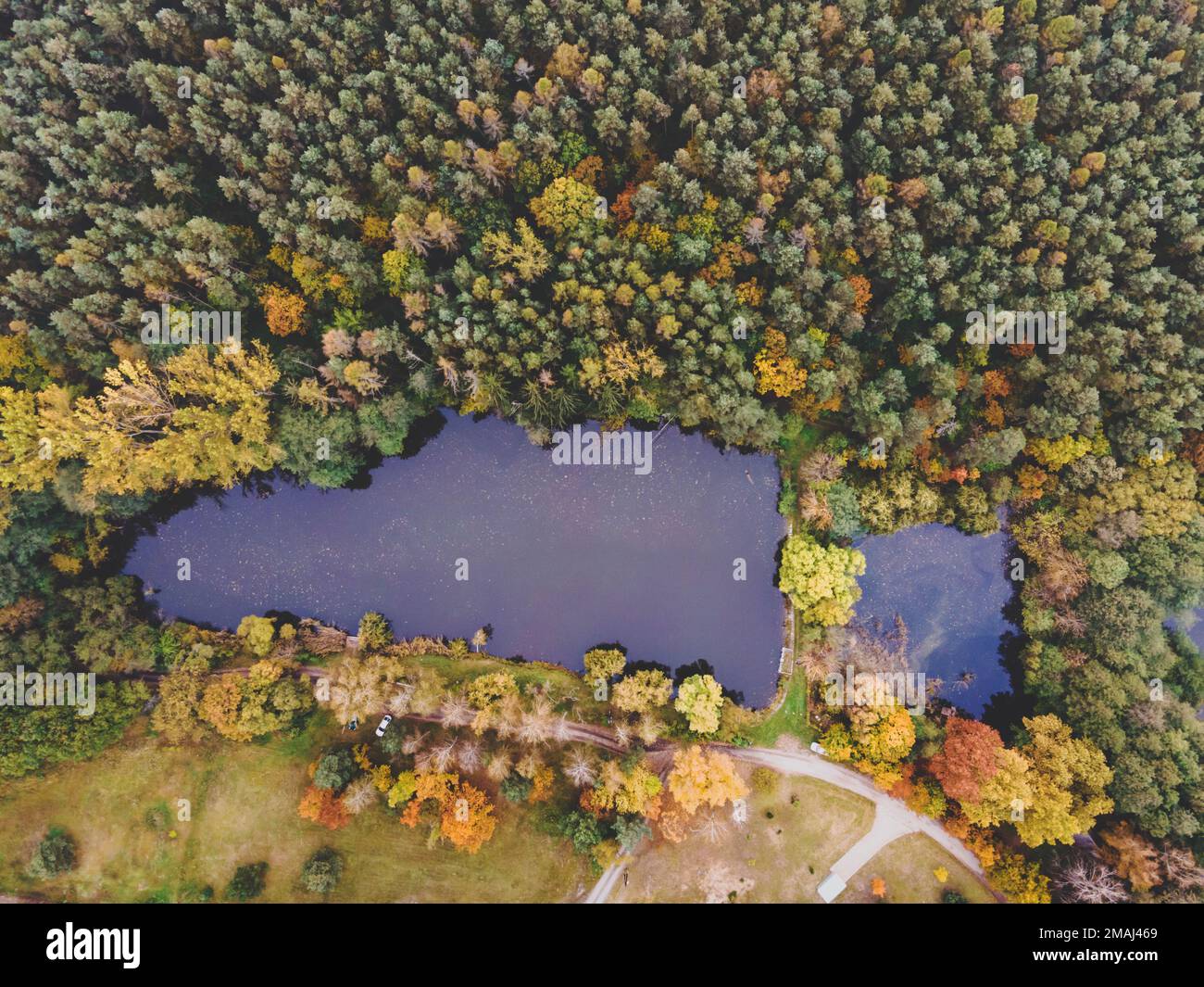Aerial shot of Lake Nyírjes with autumn surroundings and colors, Balassagyarmat, Hungary Stock Photo