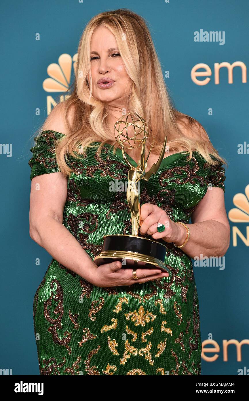 Jennifer Coolidge poses with the Emmy for outstanding supporting
