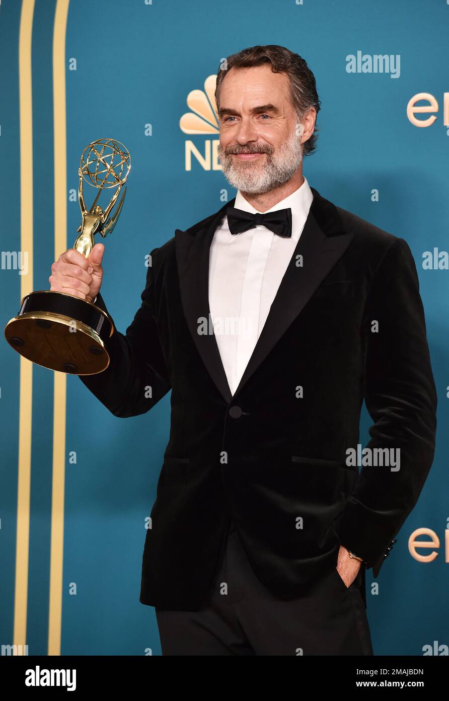 Murray Bartlett poses with the Emmy for outstanding supporting actor in(01)