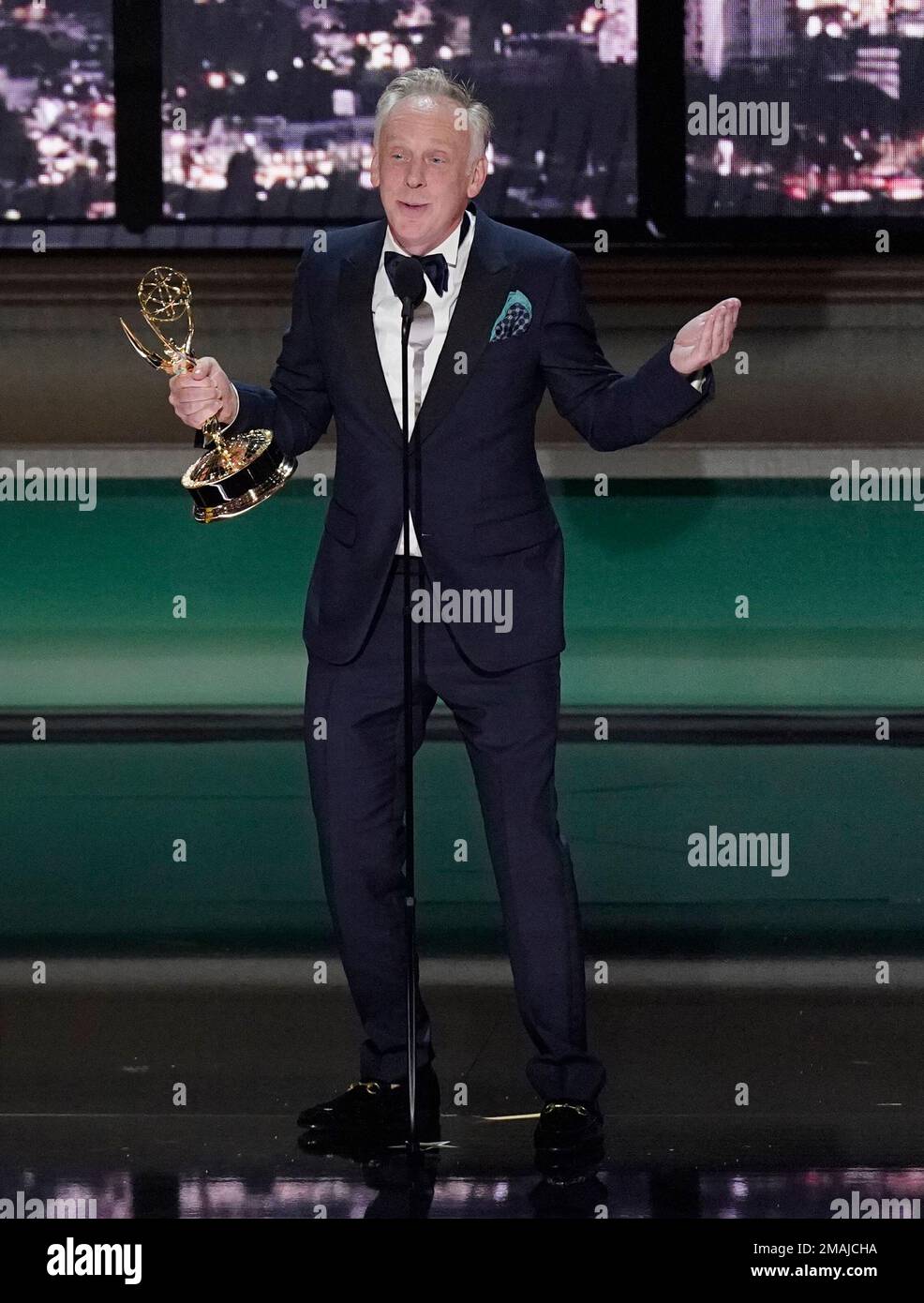 Mike White accepts the Emmy for outstanding writing for a