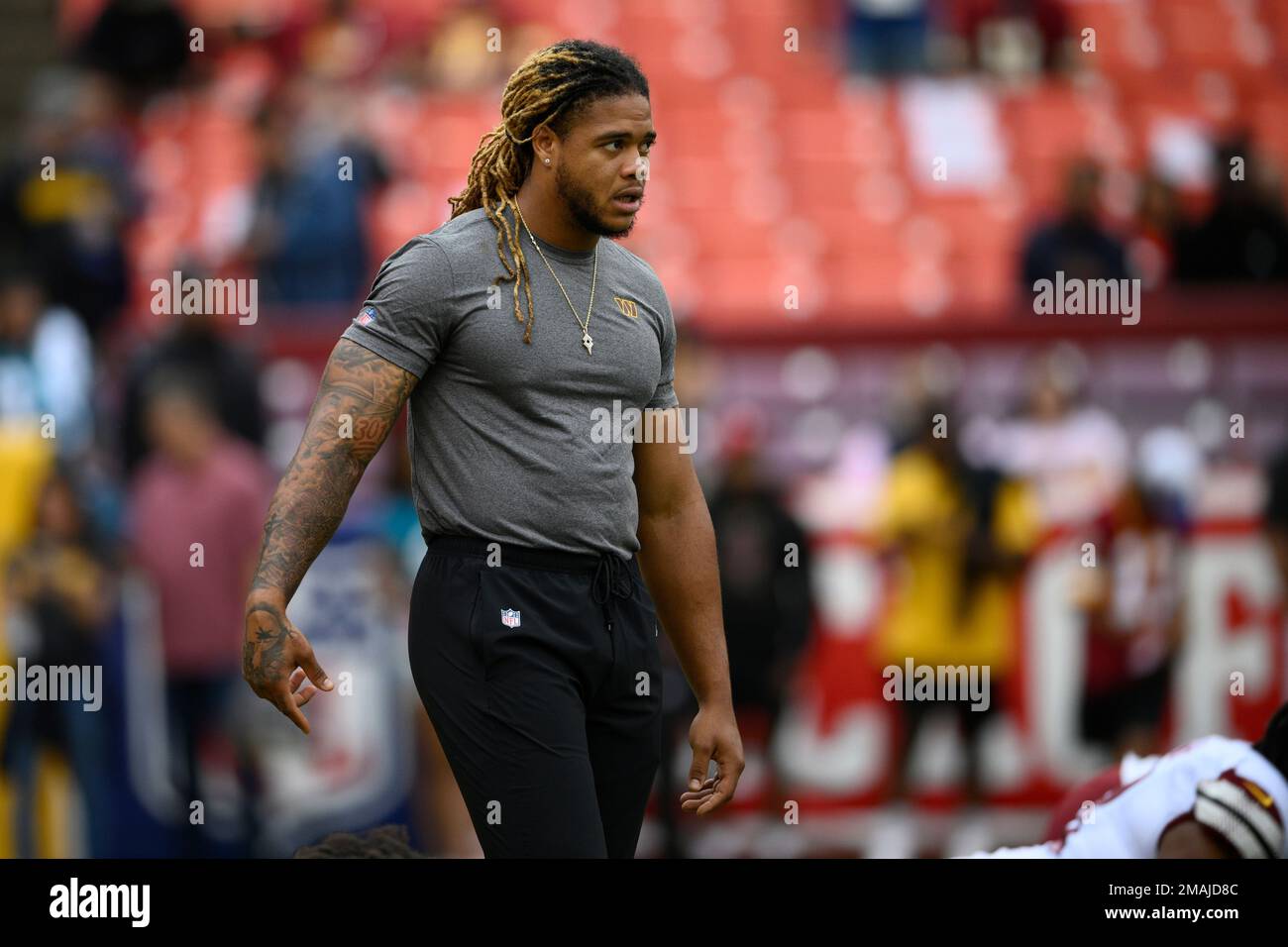 Washington Commanders defensive end Chase Young looks on before a NFL ...