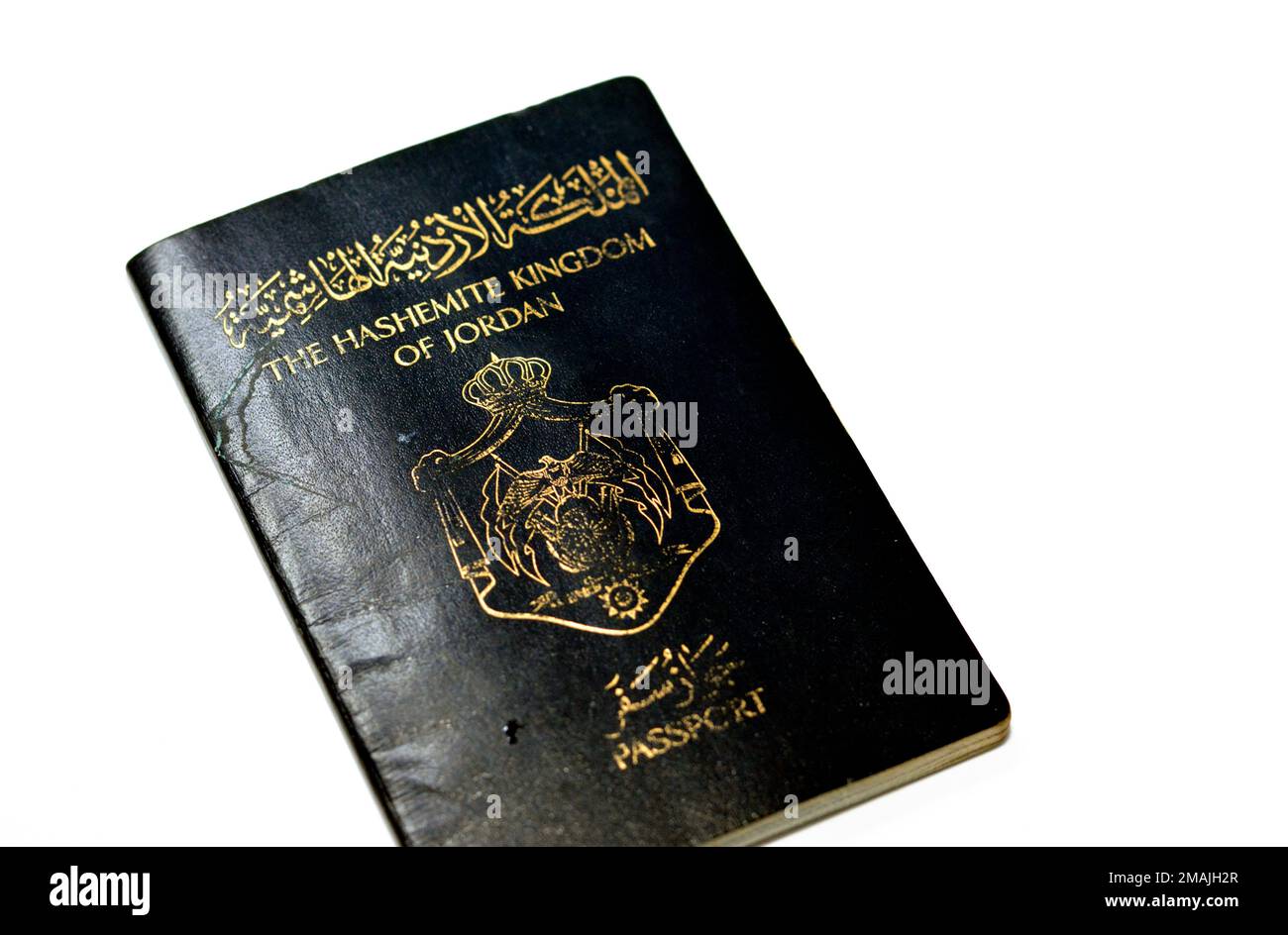 Jordanian passport Identity for citizens, Kingdom of Jordan Hashemite  Passport with Jordan's coat of arms issued to citizens of Jordan by civil statu Stock Photo