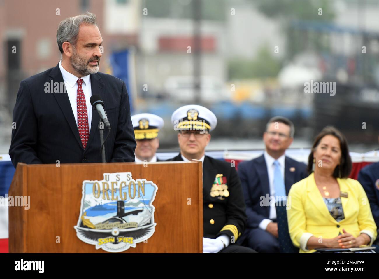 220528-N-GR655-0087 GROTON, Connecticut (May 28, 2022) – Tommy Ross, performing the duties of Assistant Secretary of the Navy for Research, Development, and Acquisition, delivers remarks during a commissioning ceremony for the Virginia-class fast attack submarine USS Oregon (SSN 793) in Groton, Conn., May 28, 2022. SSN 793, the third U.S Navy ship launched with the name Oregon and first in more than a century, is a flexible, multi-mission platform designed to carry out the seven core competencies of the submarine force: anti-submarine warfare; anti-surface warfare; delivery of special operatio Stock Photo